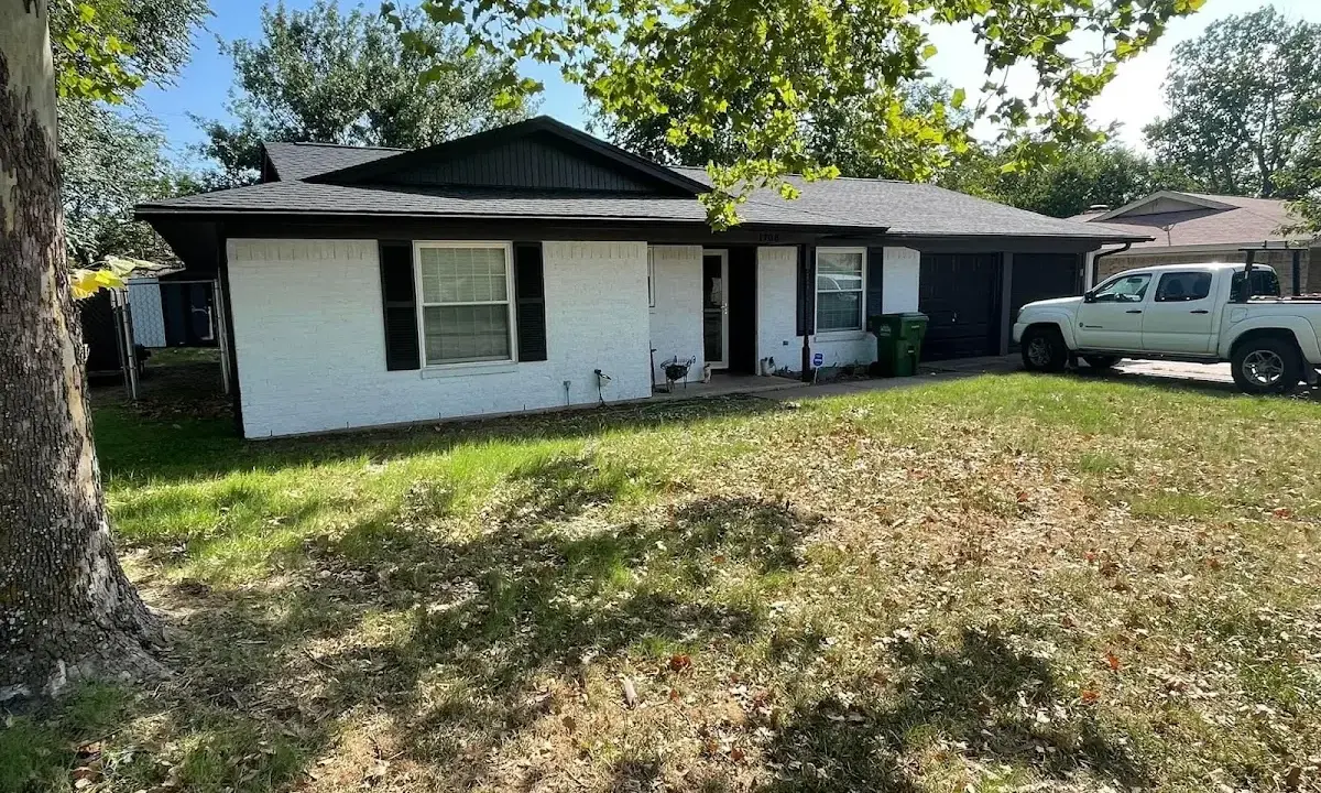 Professional roofing crew working on a residential roof in Batavia